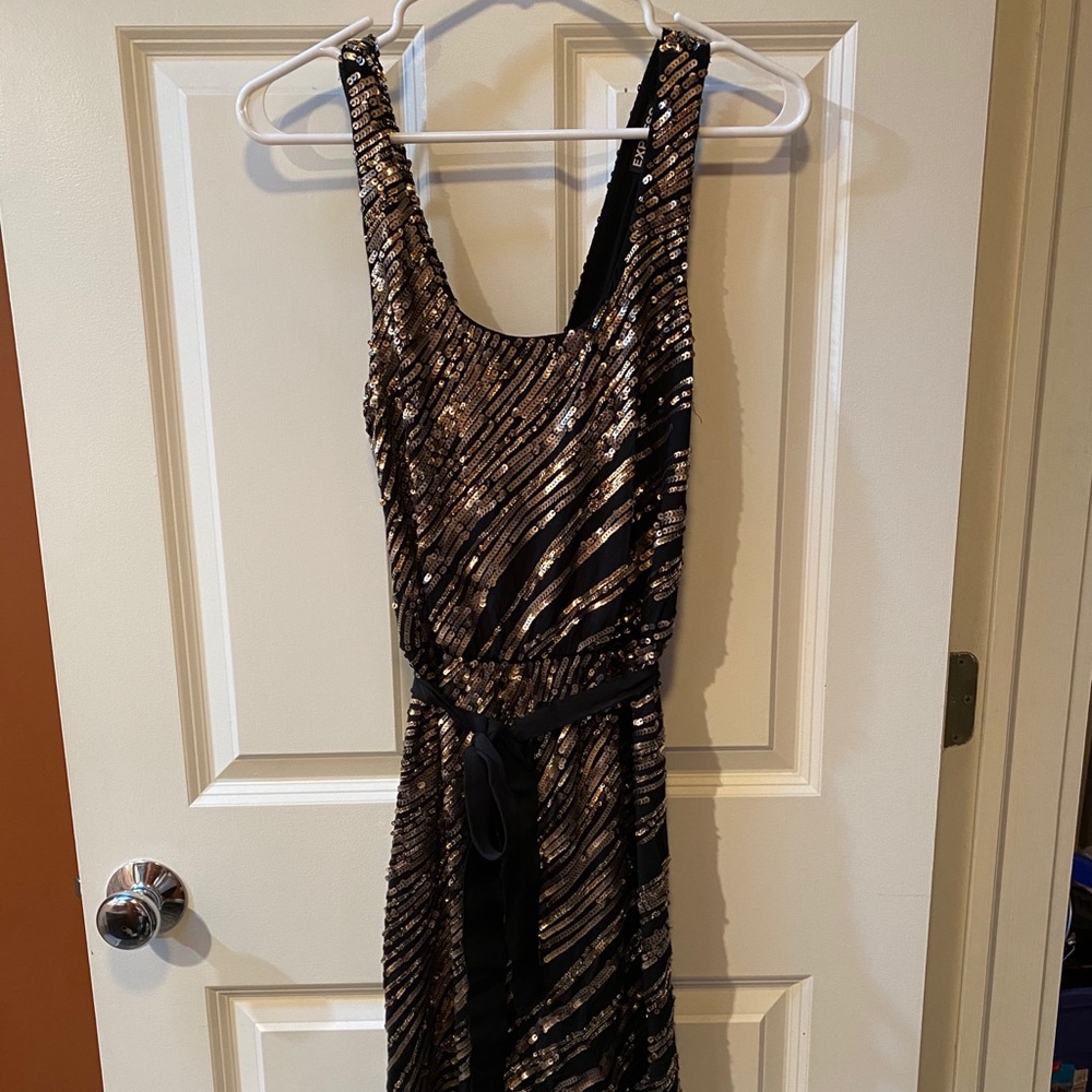 Black and gold sequin dress